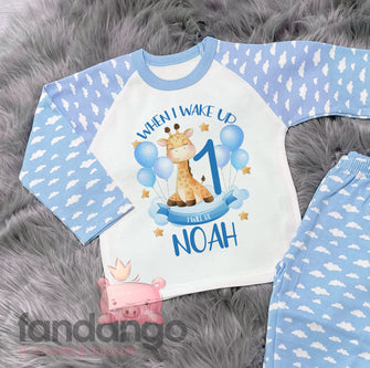 Personalised 1st birthday giraffe pyjamas - blue cloud sleeves